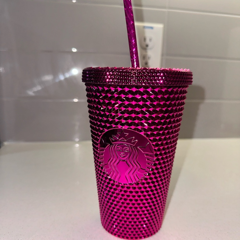Grande reuseable Starbucks tumbler in metallic magenta pink